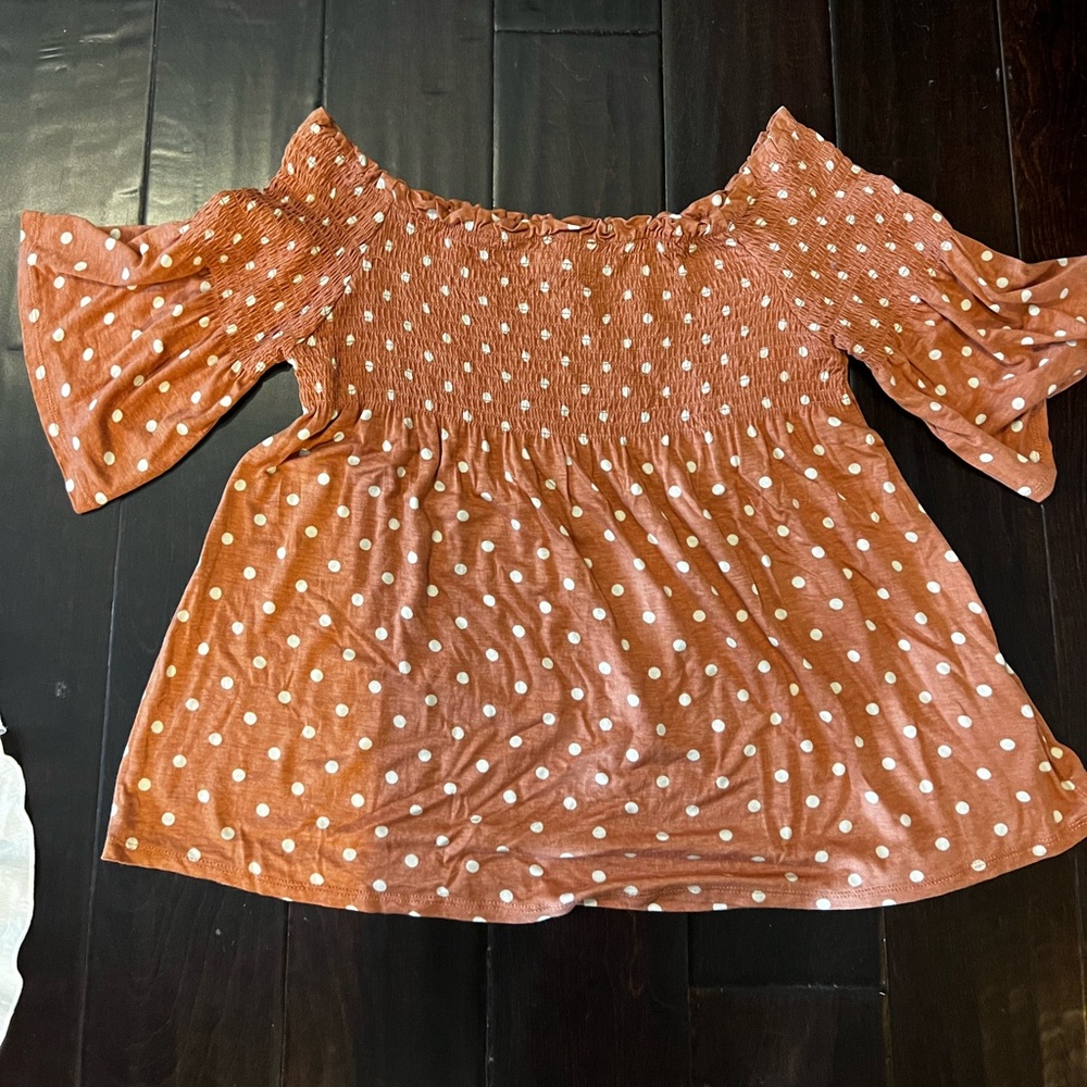 Rust colored white polka dot shirt